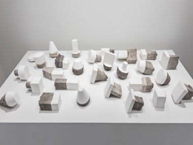 Deborah Wang, Earth Plugs, 2014, white gypsum cement, dimensions variable, from Loose Ends, Critical Distance Centre for Curators 2016. Installation documentation by Toni Hafkenscheid.