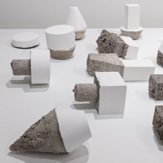 Deborah Wang, Earth Plugs (detail), 2014, white gypsum cement, dimensions variable, from Loose Ends, Critical Distance Centre for Curators 2016. Installation documentation by Toni Hafkenscheid.