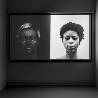 Jeannette Ehlers and Particia Kaersenhout, The Image of Me, 2012, B/W video with stereo audio, 6 min, installation view, from Crossing the Line: Contemporary Art from Denmark, Critical Distance Centre for Curators, 2016. Installation documentation by Toni Hafkenscheid.