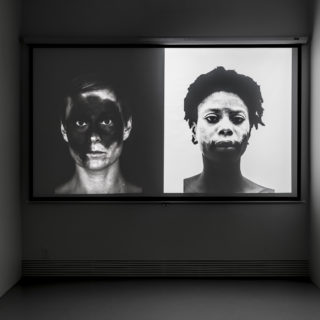 Jeannette Ehlers and Particia Kaersenhout, The Image of Me, 2012, B/W video with stereo audio, 6 min, installation view, from Crossing the Line: Contemporary Art from Denmark, Critical Distance Centre for Curators, 2016. Installation documentation by Toni Hafkenscheid.