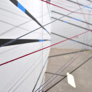 Valparaíso (installation views), 2012. Thread, nails, and tape, 20 x 11 feet. Site-specific installation.