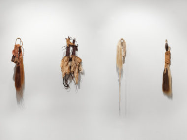 Remains of the Ephemeral I-IV, 2014. Cheesecloth, silk, cotton, sisal, unspun wool, horsehair, coyote fur, rubberlatex, black tea, dye, rusted steel. 24″ x 6″ (I), 30″ x 5″ (II), 22″ x 6″ (III), 32″ x 6″ (IV).