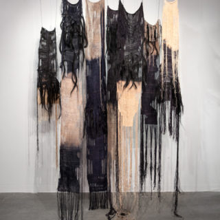Shrouds, 2014. Handwoven and hand-dyed linen, horsehair and bleach. 8’ x 4’ x 3’.