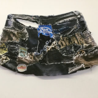 Amelia Merhar, Patched Skirt, colour photograph of clothing, 2017, in Moving Home, curated by Amelia Merhar, Critical Distance Centre for Curators, 2017. Installation documentation by Shani K Parsons.