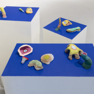 Alex Sheriff, Undiscovered Man-Made Islands, 2016-17, gouache on clay, dimensions variable, from We Look at Animals Because, Critical Distance Centre for Curators, 2017. Installation documentation by Toni Hafkenscheid.