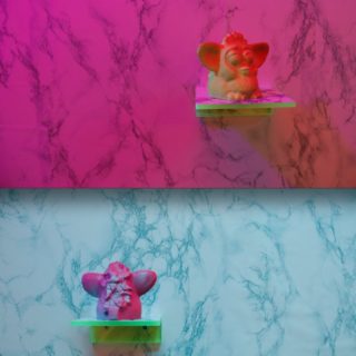 Adrienne Crossman, Furbies, 2017, 3D prints, spray paint, neon plexiglass, adhesive vinyl.